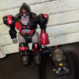 Dynamic Black and Red Action Transformer with Batman Vehicle